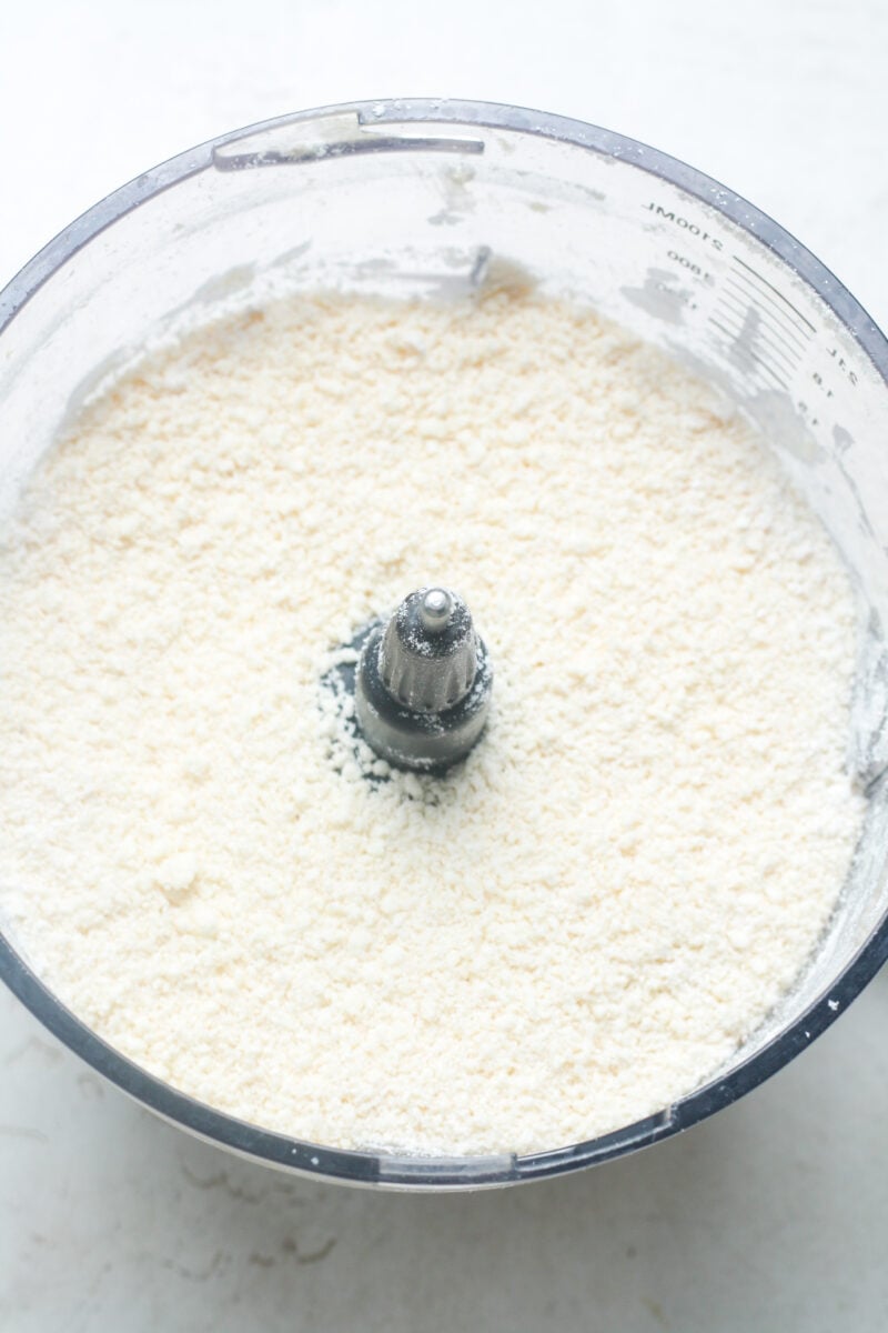 Butter crumbles in food processor.