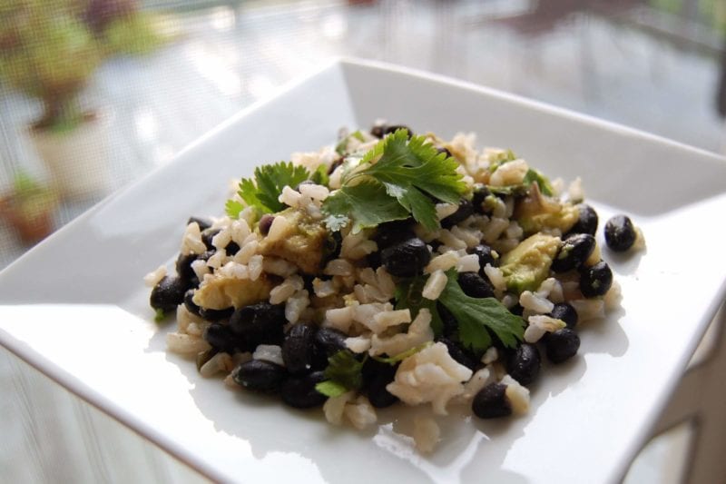 Black beans and rice on a plate. 