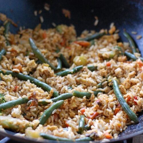 fried rice in a wok on 100 days of real food