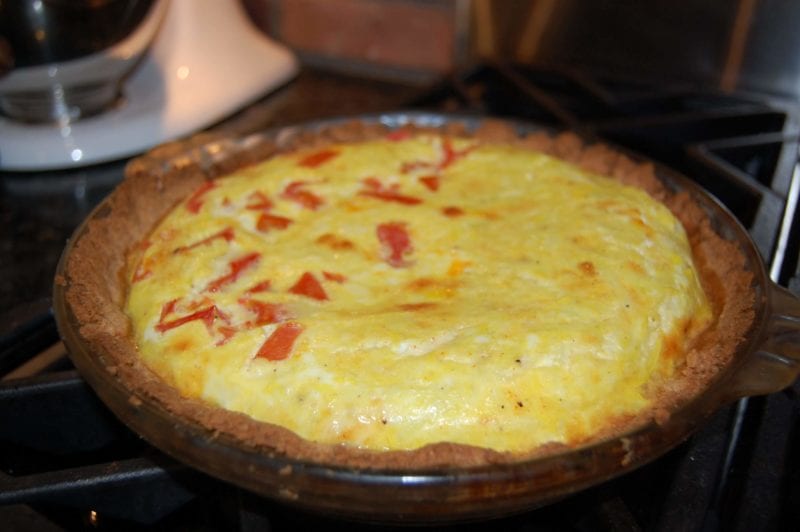 Homemade quiche with a whole-wheat crust. 